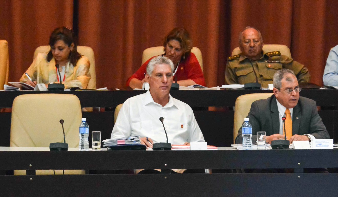 Miguel Diaz-Canel (centre) and Homero Acosta (right) at the National Assembly session on July 21, 2018. Photo: AFP