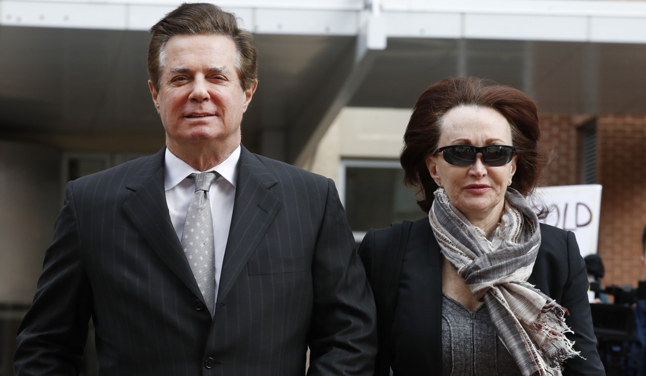 In this March 8, 2018, file photo, Paul Manafort, left, President Donald Trump's former campaign chairman, walks with this wife Kathleen Manafort, as they arrive at the Alexandria Federal Courthouse. Photo: AP