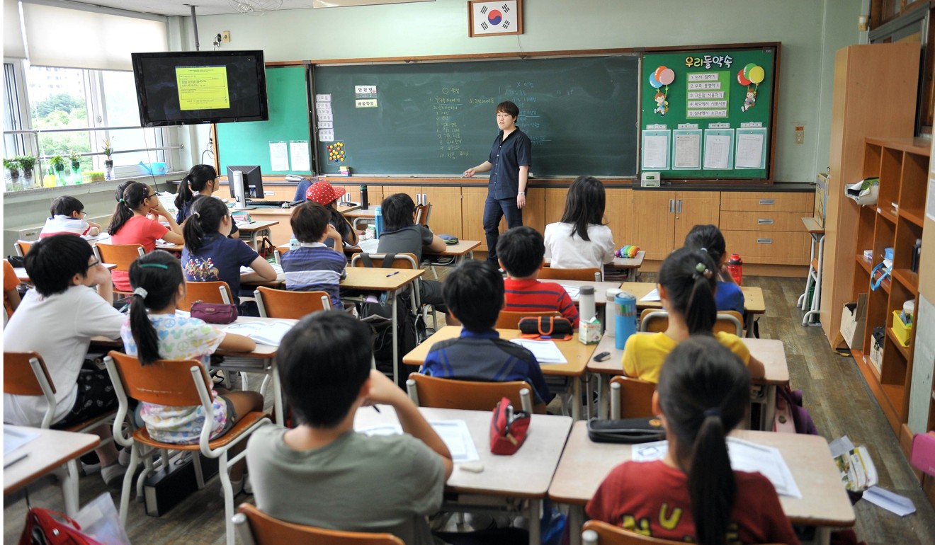 South Korean children take a special class on smartphone addiction. Photo: AFP