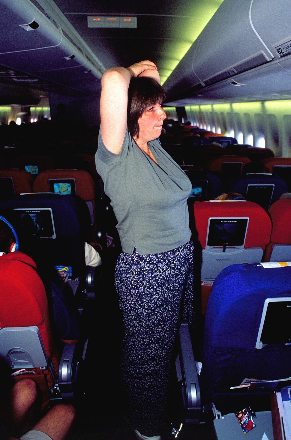 Getting moving on a flight helps prevent DVT. Photo: Alamy