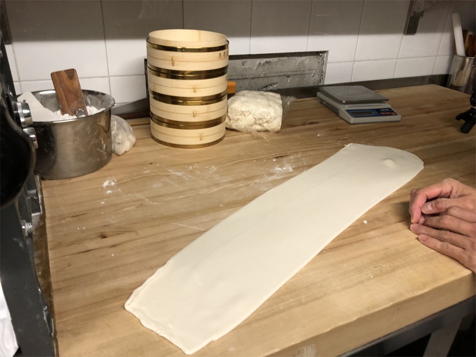 Flatten the dough before rolling it up. Photos: Aydee Tie