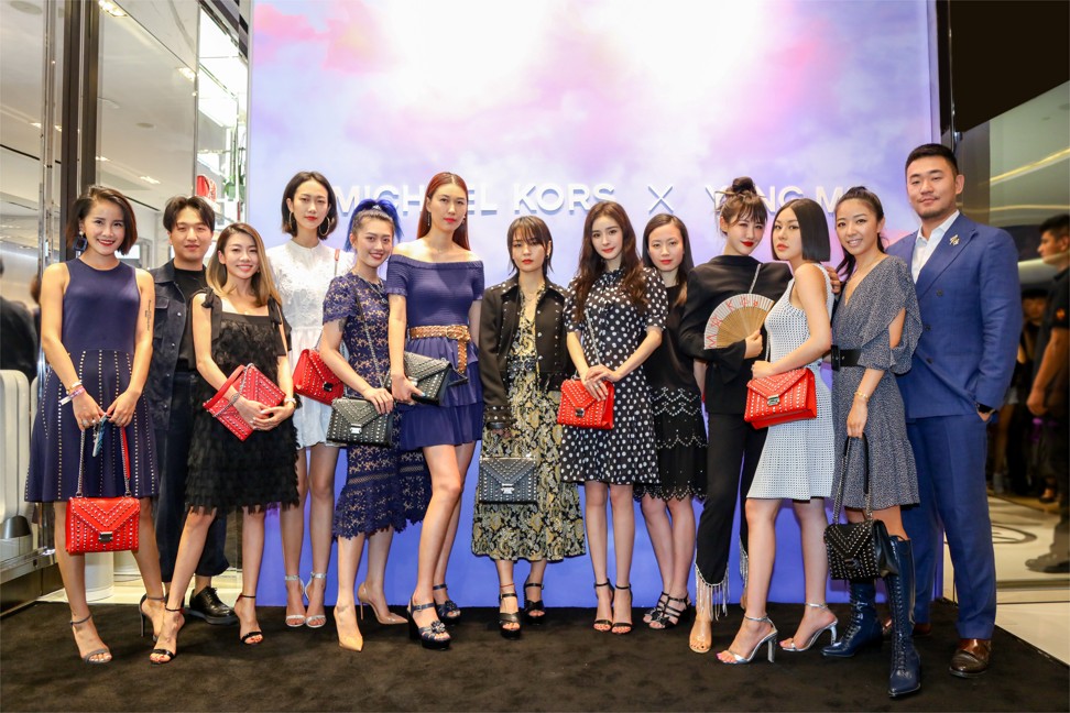 Chinese celebrities and influencers at an event to celebrate the Michael Kors x Yang Mi Whitney handbag collaboration.