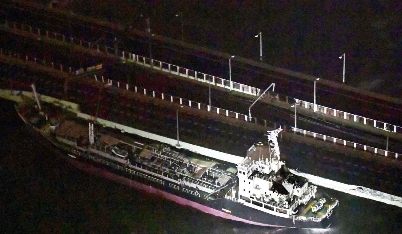 A 2,591-tonne tanker, which is sent by strong wind caused by Typhoon Jebi, crashes into a bridge that connects to Kansai airport. Photo: Reuters