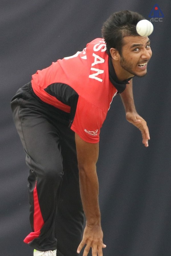 Ehsan Nawaz bowls against UAE. Photo: ACC