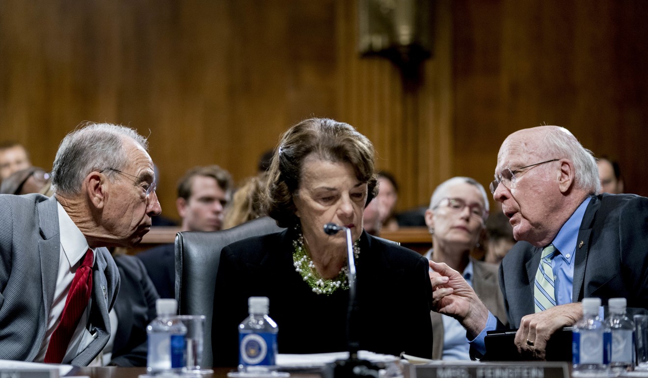 Feinstein, who received the letter making allegations against Kavanaugh, is flanked by Grassley, left, and Senator Patrick Leahy. Photo: AP