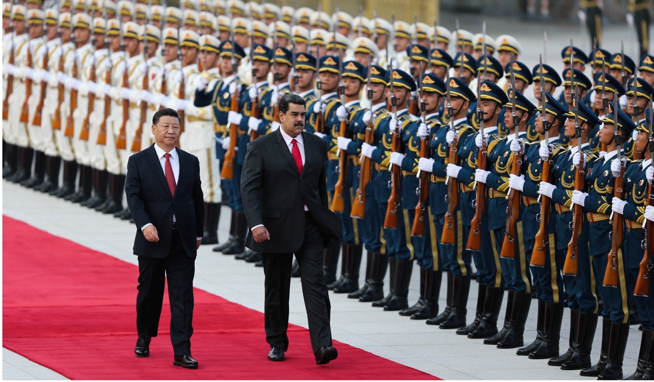 Chinese President Xi Jinping walks next to Venezuela's President Nicolas Maduro during his welcoming ceremony in Beijing on September 14. Photo: Reuters