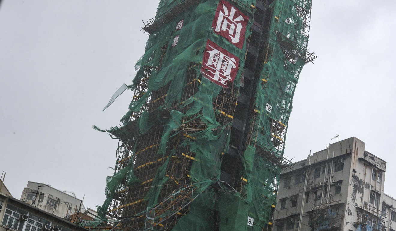 Residential building Enchantee under construction in Tai Kok Tsui breaks apart as Typhoon Signal No 10 lashes the area. Photo: Nora Tam
