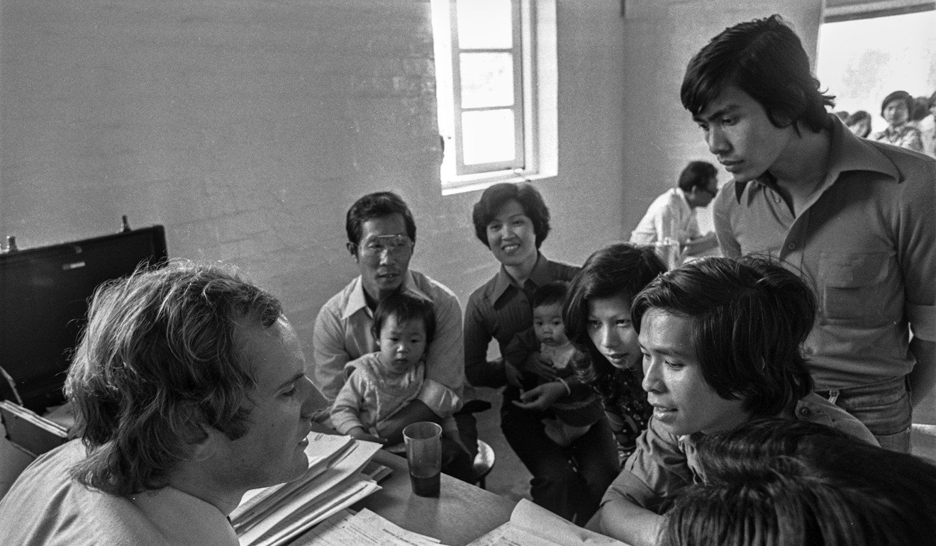A Canadian immigration officer interviews a Vietnamese family in a refugee camp in Sham Shui Po in 1979. Photo: C.Y. Yu