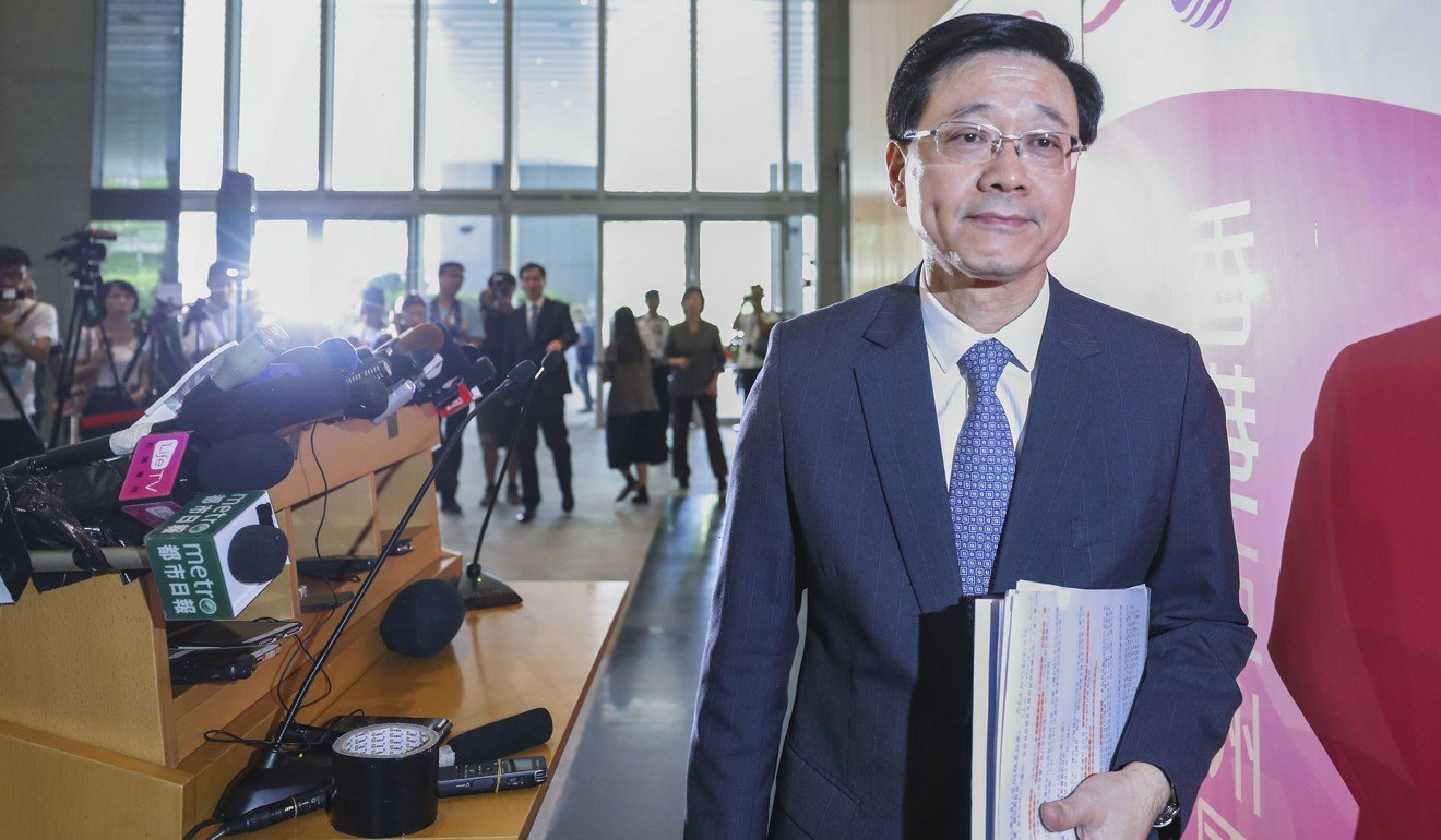 Secretary for Security John Lee announces his decision on Monday. Photo: Sam Tsang