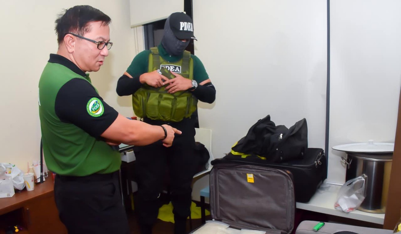 Officers during the Pasay City raid. Photo: PDEA Philippine Drug Enforcement Agency