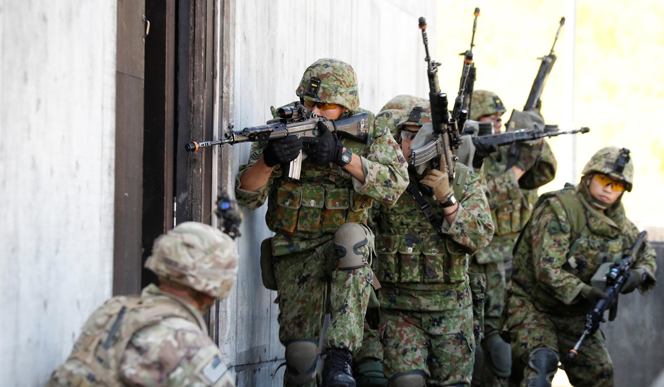 Japan Ground Self Defence Force members take part in an urban warfare drill with US soldiers near Mount Fuji in September, 2017. Photo: Reuters