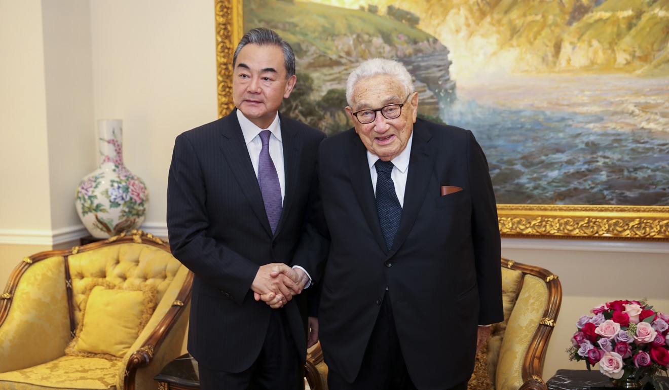 Wang Yi with former US Secretary of State Henry Kissinger in New York, on Tuesday. Photo: Xinhua