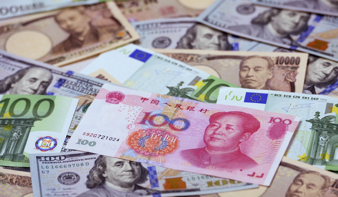 The yuan’s share of total currency reserves remains modest and well behind that of the “big three” – the US dollar, the euro and the Japanese yen – as a reserve asset. Photo: Kyodo