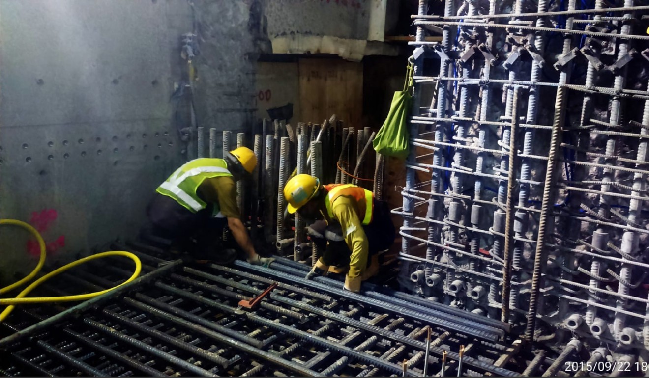Workers in uniforms and safety helmets of Leighton Contractors (Asia), the main contractor involved in the platform scandal of Sha Tin-Central rail link, were seen cutting corners, according to photographs the Post obtained. Photo: SCMP