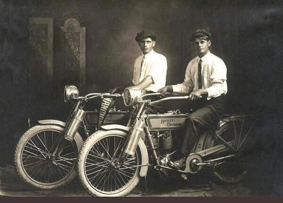 Men and their motorcycles: Harley-Davidsons, circa 1914.