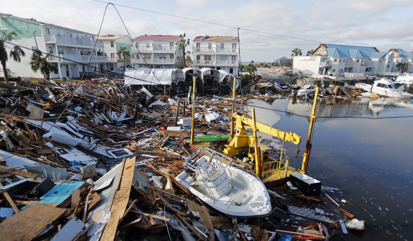 A boat sits amid debris in the aftermath of Hurricane Michael in Mexico Beach. Photo: AP Photo