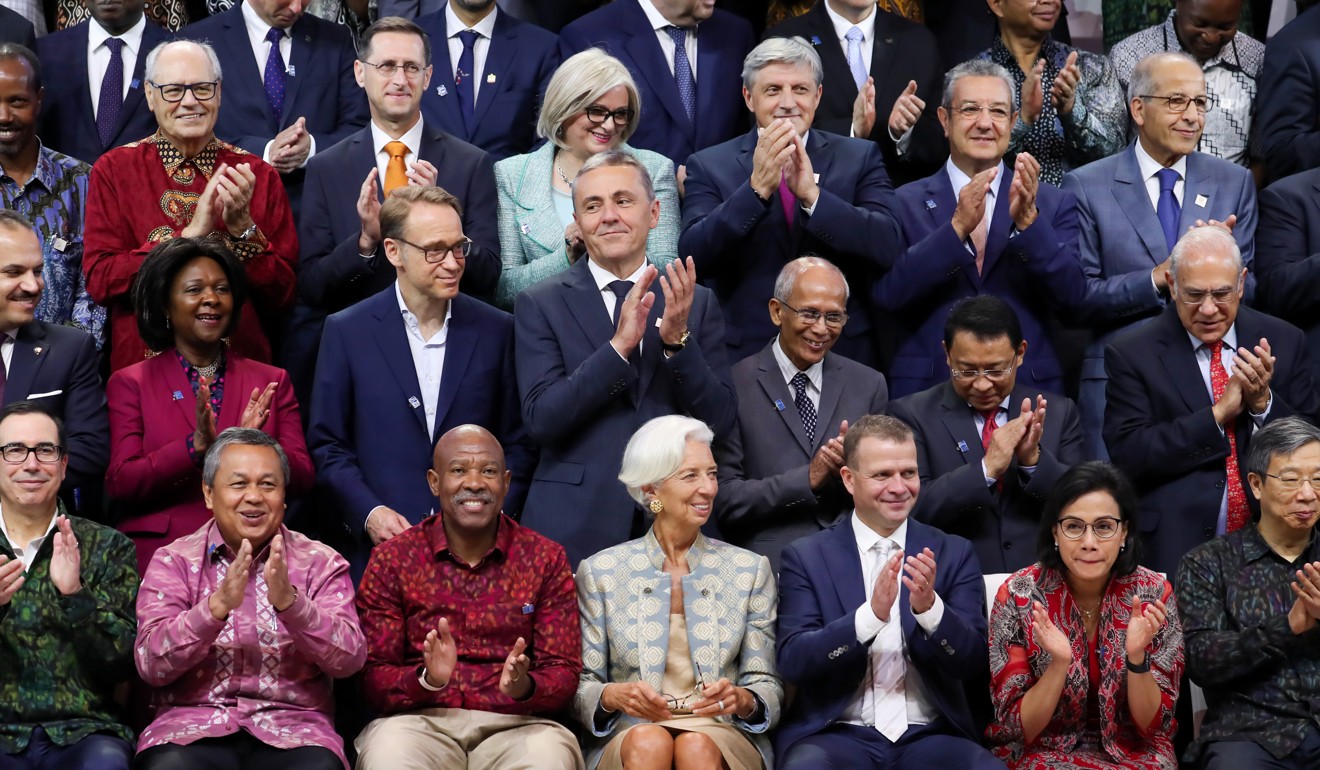 US Treasury Secretary Steven Mnuchin (front row, far left), IMF managing director Christine Lagarde (centre) and People’s Bank of China Governor Yi Gang (front row, far right) take a group photo, along with other finance ministers and central bankers, at the IMF and World Bank Group annual meetings in Nusa Dua, Bali, Indonesia, on October 13. Photo: Bloomberg