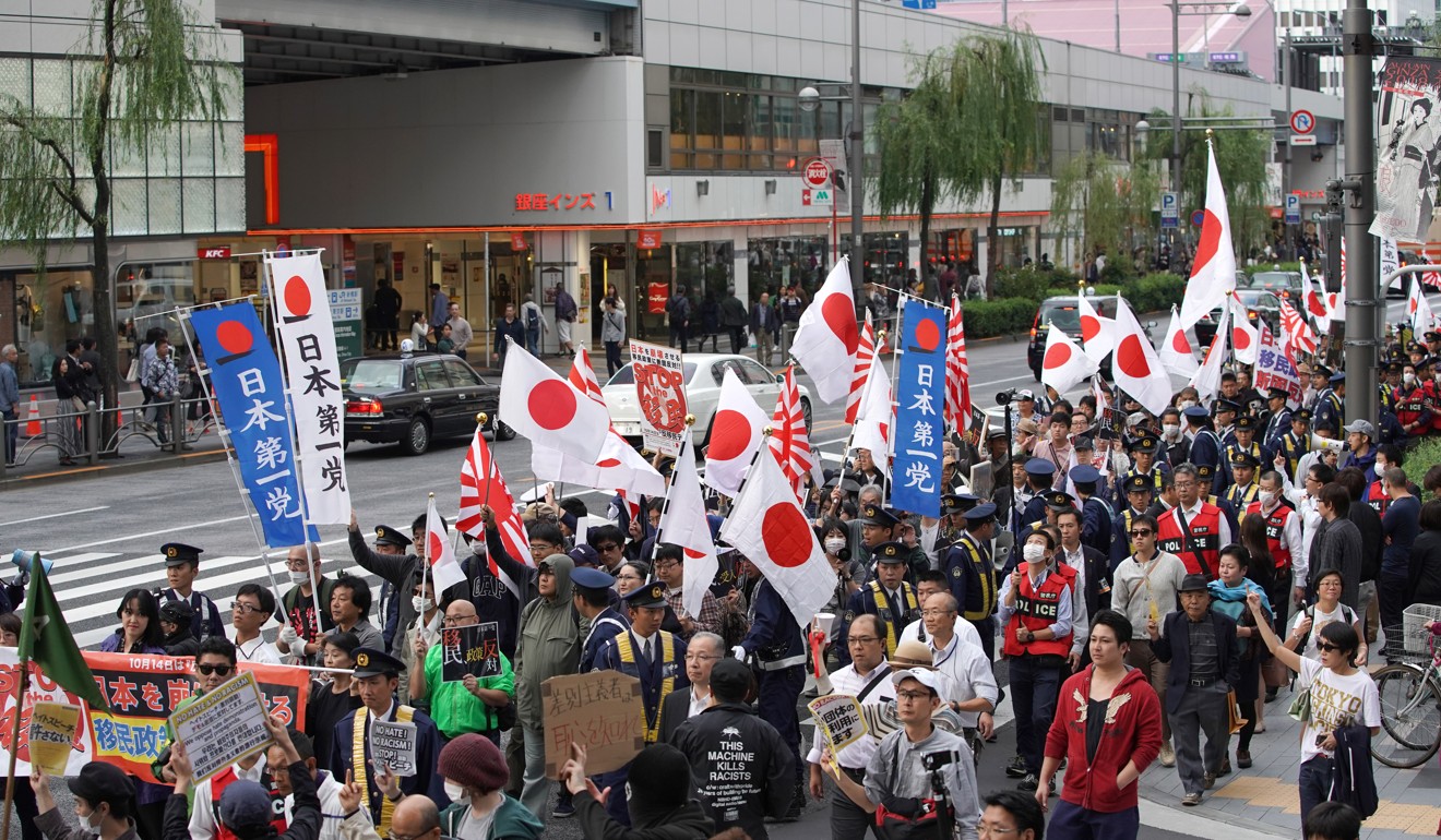 Demonstrators at a rally against Japan Prime Minister Shinzo Abe’s proposed legislation regarding foreign workers. Photo: Bloomberg