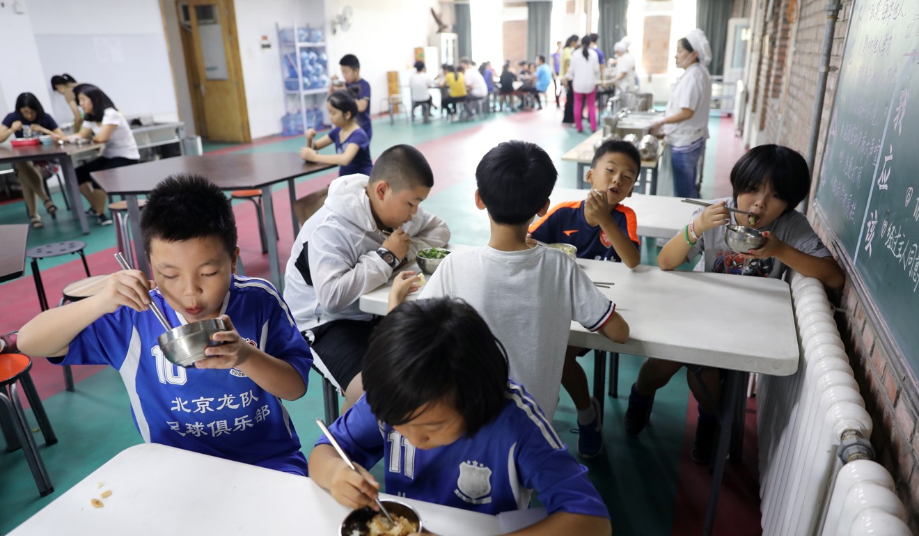 Spending on education is eating up an increasing portion of family budgets. Photo: Simon Song