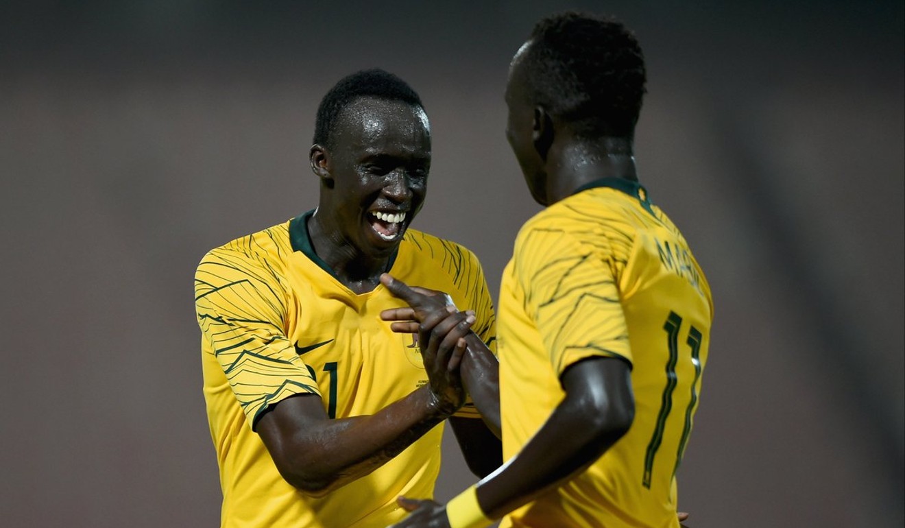 Thomas Deng and Awer Mabil, childhood friends who bonded as children in Adelaide after coming to Australia from South Sudan, after their debuts for the Socceroos. Photo: Twitter