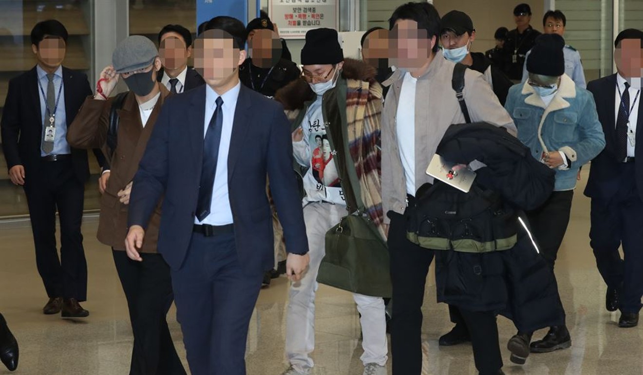 Is that K-pop boy band BTS hiding behind the masks?