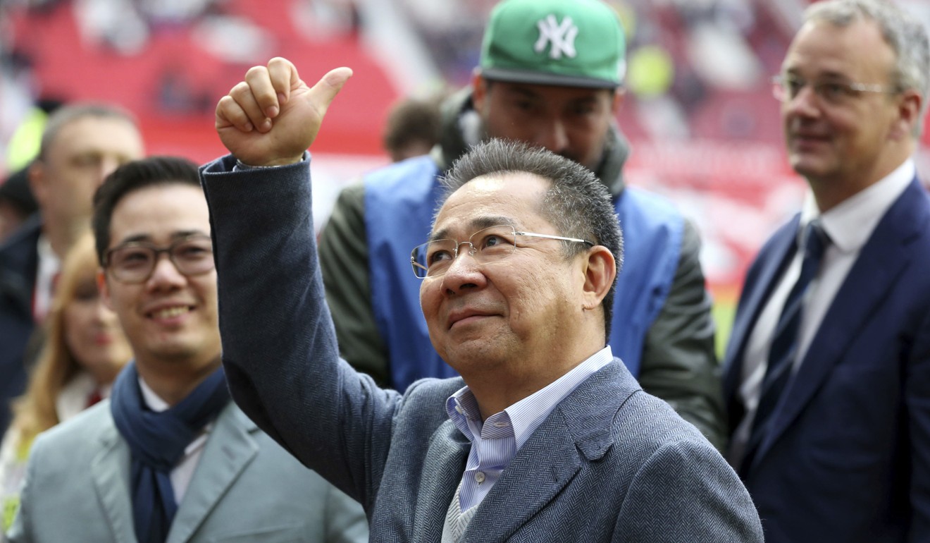Leicester City Chairman Vichai Srivaddhanaprabha gestures to the crows at a soccer game against Manchester United in 2016. Photo: AP