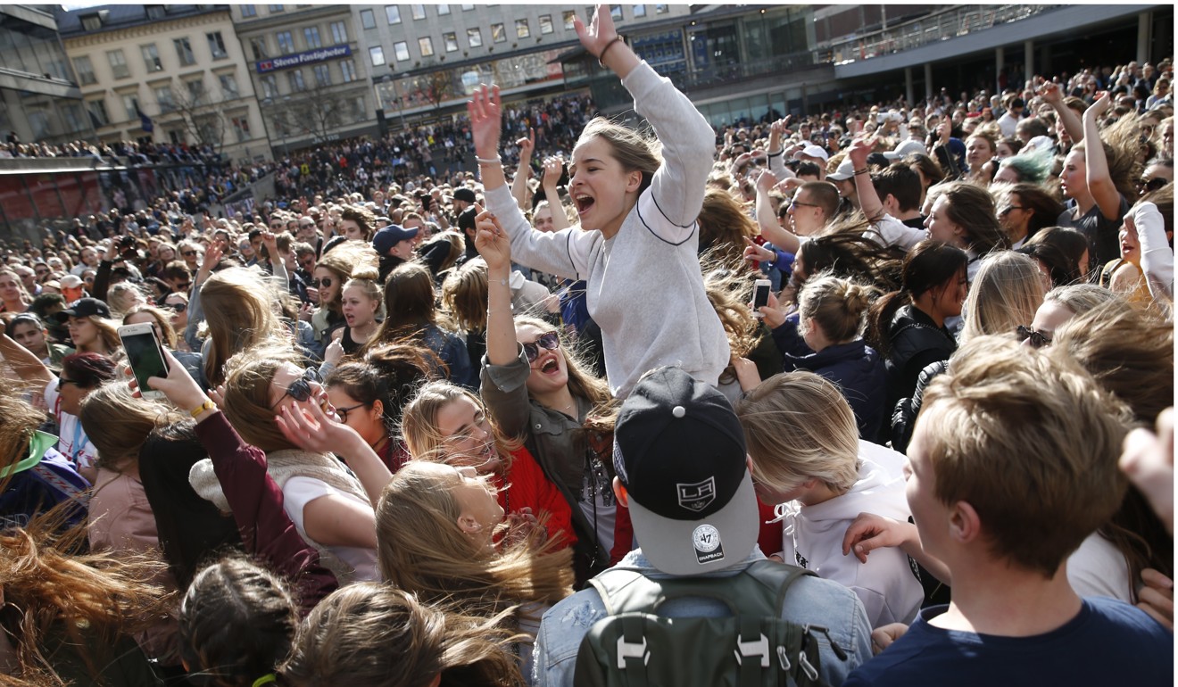 Hundreds of fans gather to honour late Swedish DJ Avicii in Stockholm. Photo: EPA