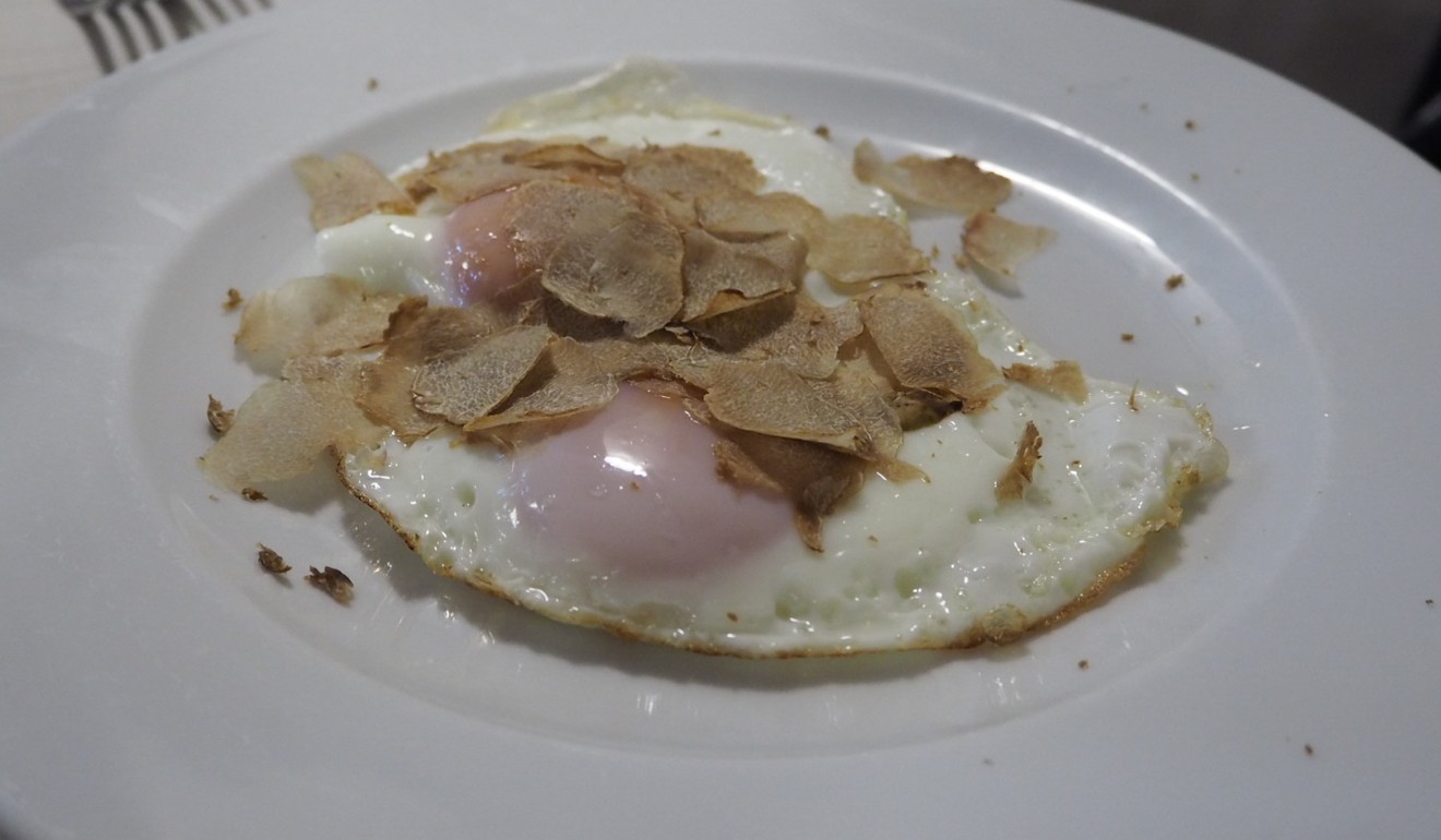 Fried eggs with white truffle at Osteria del Boccondivino. Photo: Janice Leung Hayes