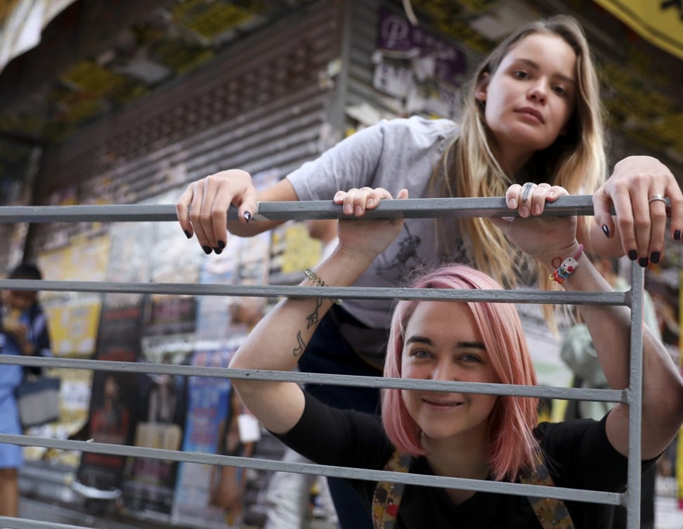 Pussy Riot members Olya Kurachyova (front) and Nika Nikulshina in Hong Kong, where they are attending an LGBT rights forum. Photo: Nora Tam