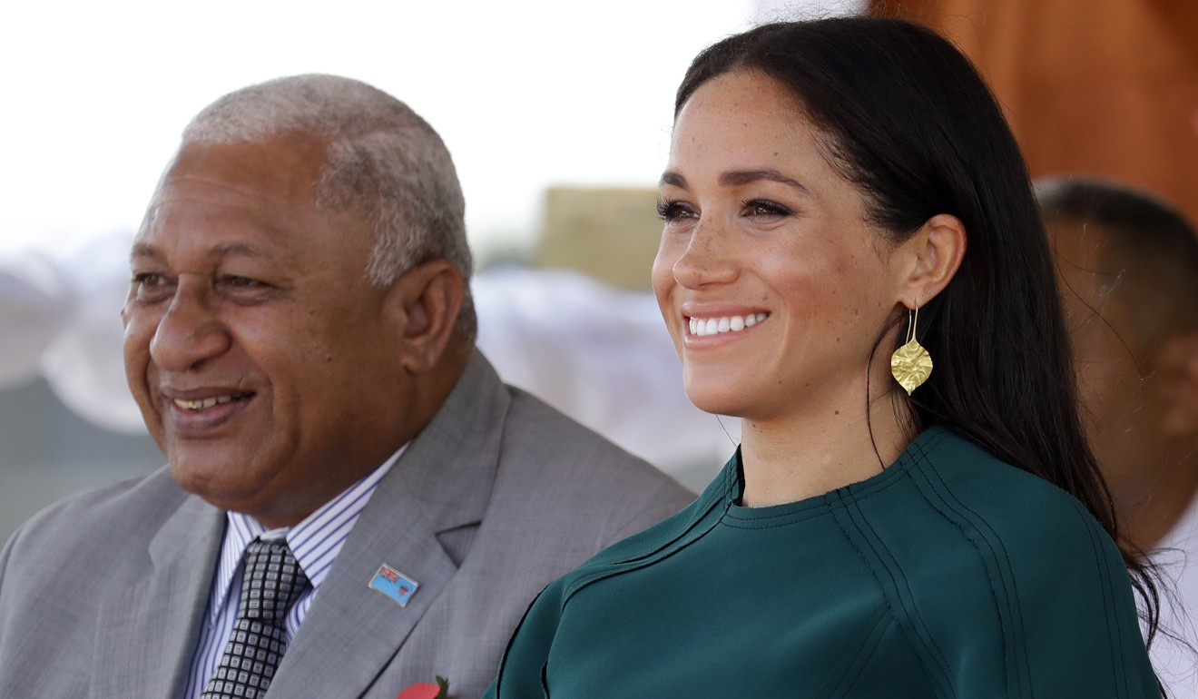 Fiji Prime Minister Frank Bainimarama with the Duchess of Sussex during the royal visit in October. Photo: AP
