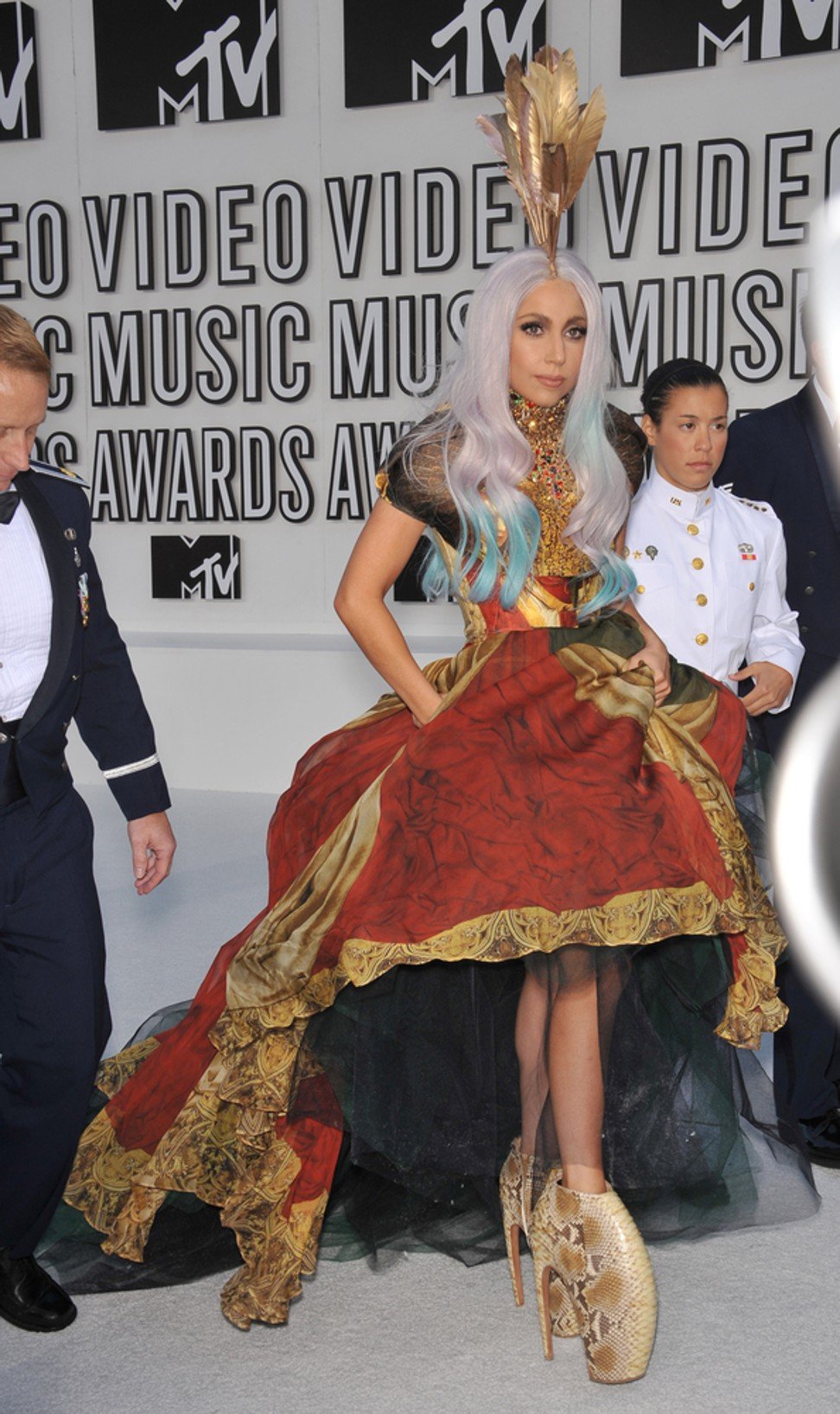 Lady Gaga wears an Alexander McQueen dress and Armadillo boots at the 2009 MTV awards to pay tribute to the designer.