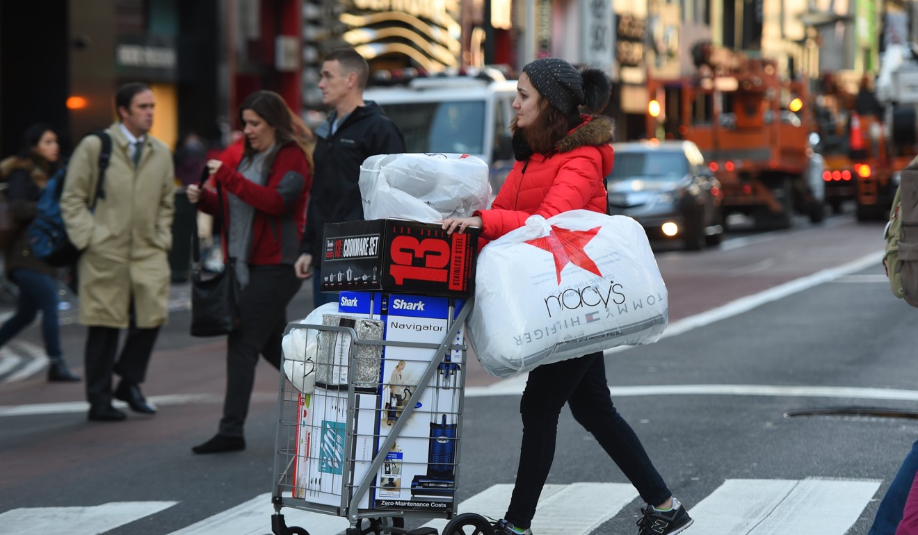 A shopper in New York on Black Friday in 2017. Photo: AFP