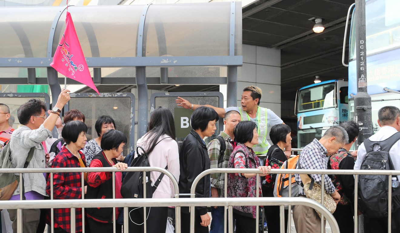 Passengers queue up for buses at Tung Chung. Photo: Winson Wong