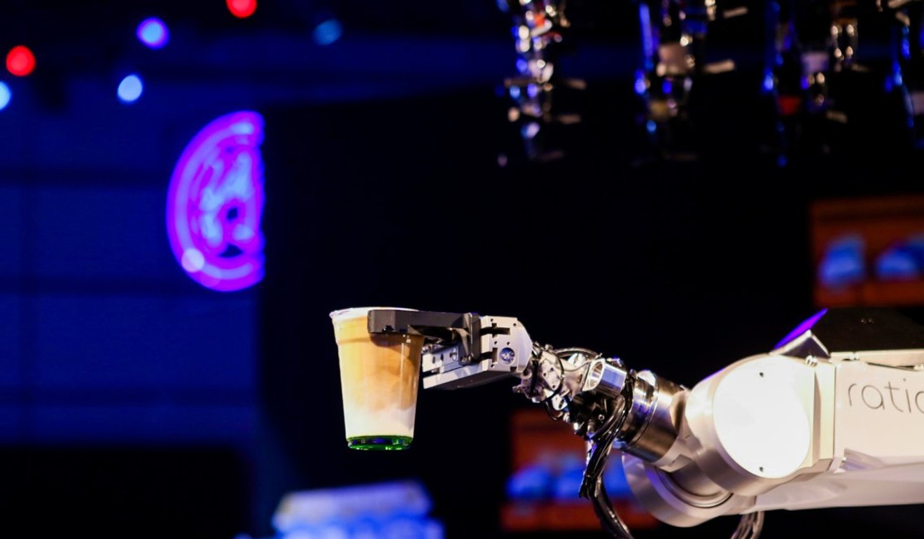 A robot serves coffee in the media centre during Alibaba’s Singles’ Day gala in Shanghai.