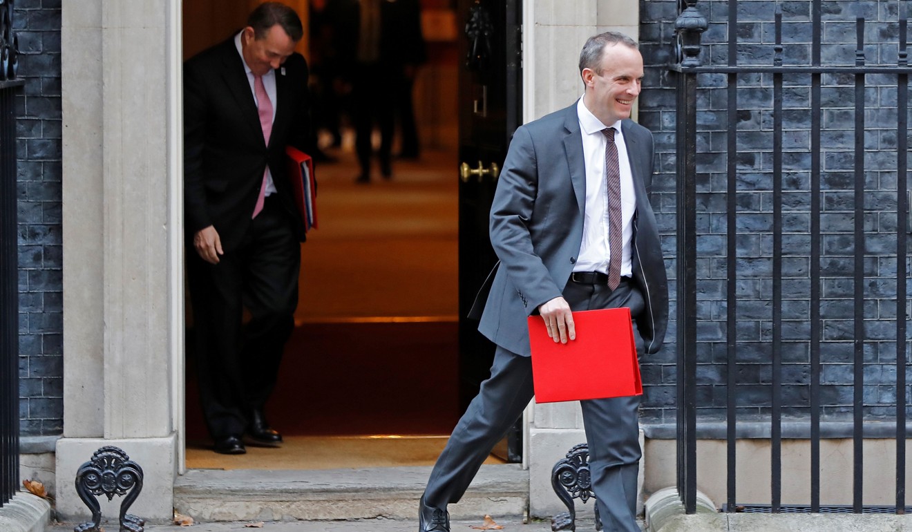Britain's International Trade Secretary Liam Fox, left, and Secretary of State for Exiting the European Union (Brexit Minister) Dominic Raab leave the weekly meeting of the UK Cabinet at 10 Downing Street in London on Tuesday. Photo: AFP