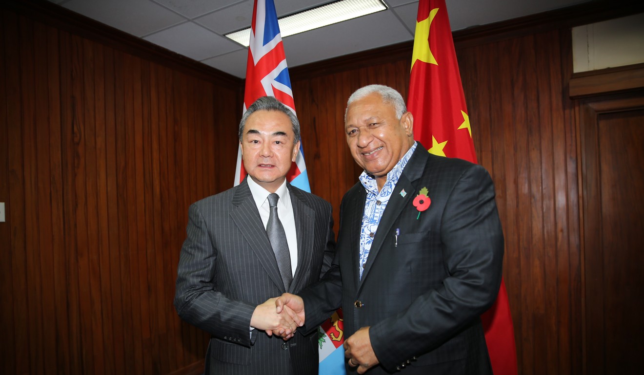 China’s Foreign Minister Wang Yi and Fiji’s Prime Minister Voreqe Bainimarama. File photo: Xinhua