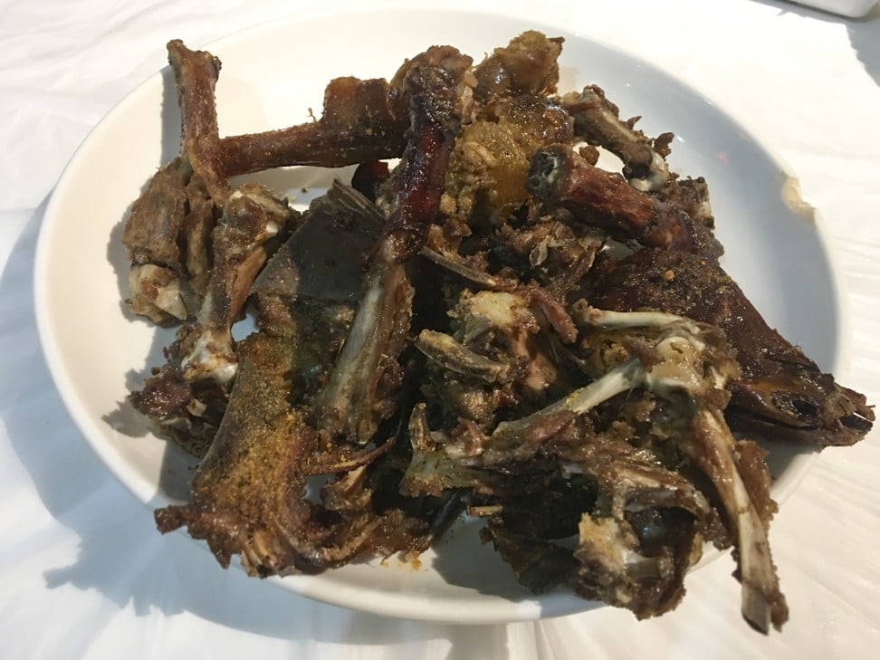 Deep-fried salted duck bones at Liqun Roast Duck. Photo: Elaine Yau