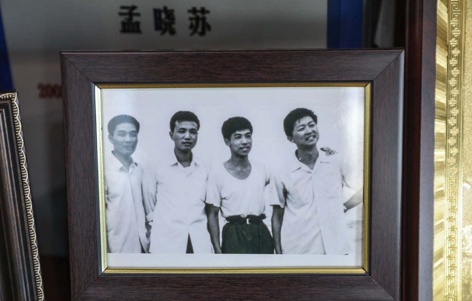 A photo showing Meng Xiaosu, far right, with later Chinese premier Li Keqiang, second left, was taken when they were studying at Peking University. The photo is in Meng's office. Photo: Simon Song.