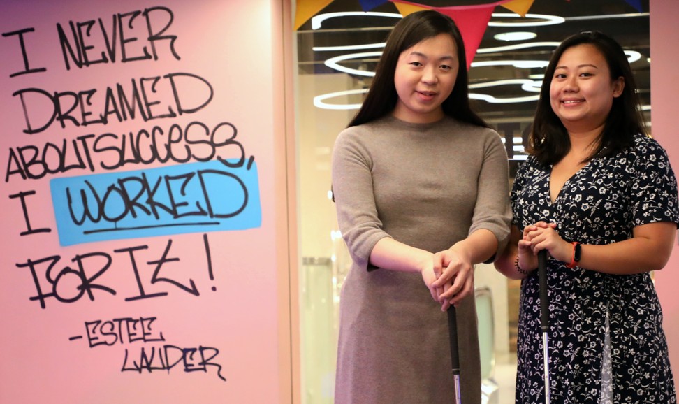 Jane Manchun Wong and Post reporter Zen Soo tee off at the Strokes mini-golf club. Photo: Felix Wong