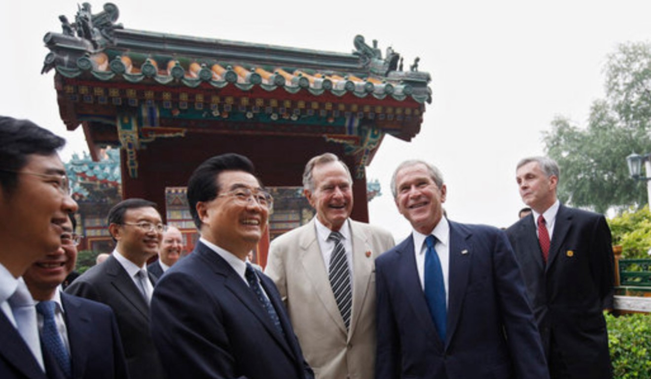 President George W. Bush is joined by his father, former president George H. W. Bush, during a visit with Chinese president Hu Jintao to Zhongnanhai in Beijing in 2008. Photo: White House