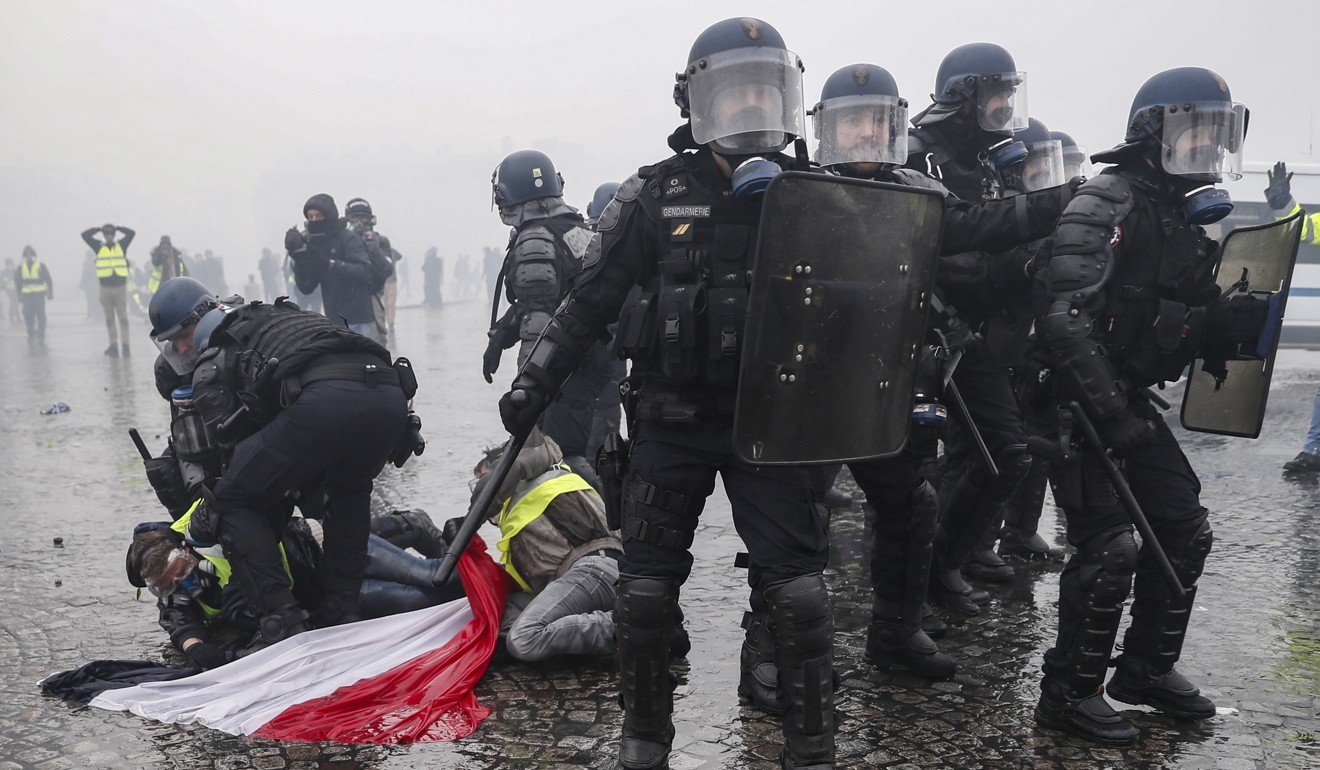 Paris burns as over 100 arrested, tear gas fired in France fuel