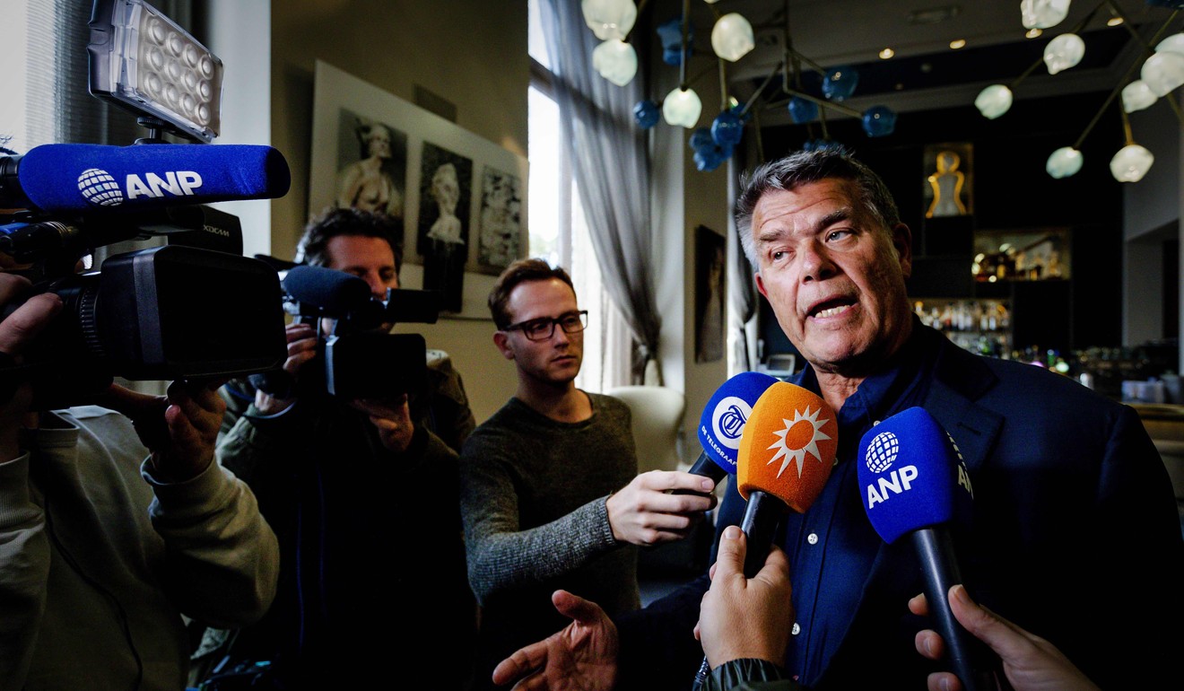 Emile Ratelband answers journalists’ questions on Monday in Amsterdam. Photo: AFP
