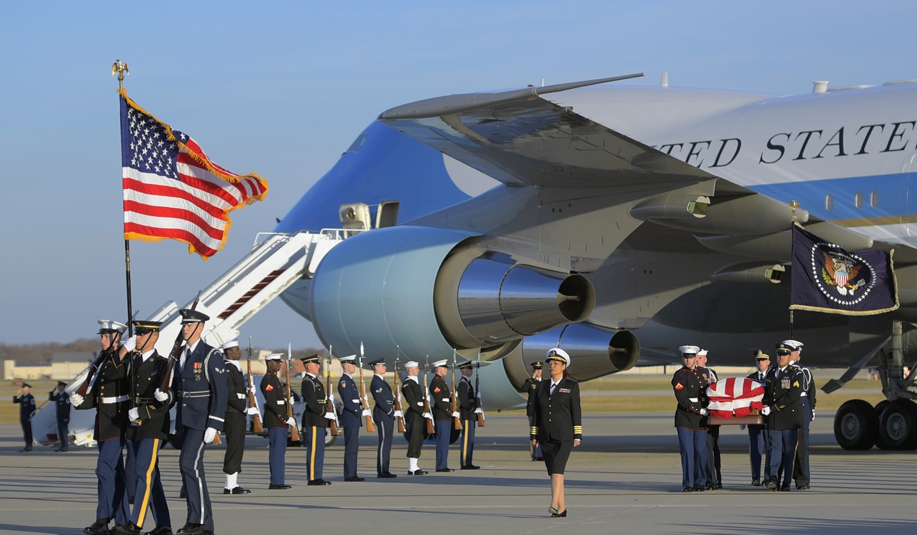 The casket containing the late president George H.W. Bush arrives at Joint Base Andrews on Monday. Photo: The Washington Post