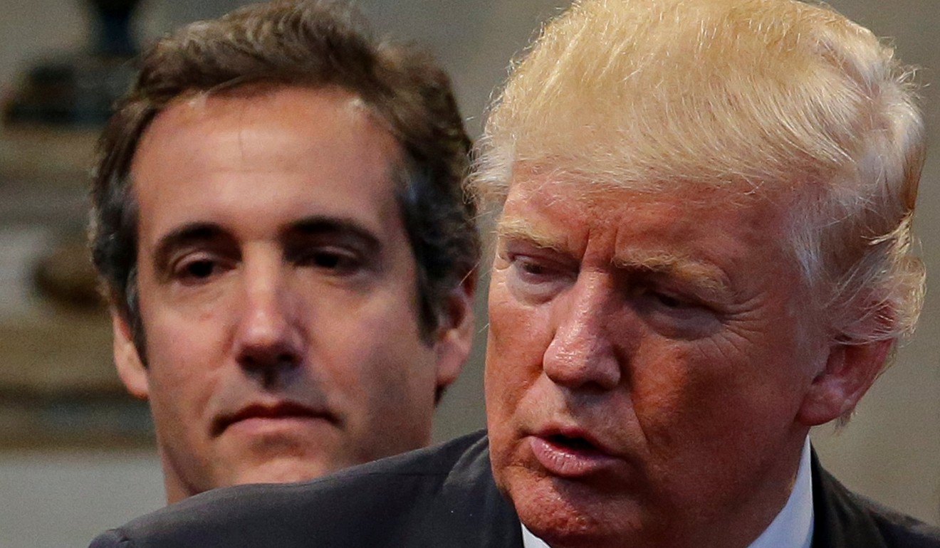 Michael Cohen standing behind Trump during a campaign stop at the New Spirit Revival Centre church in Cleveland Heights, Ohio in September 2016. Photo: Reuters