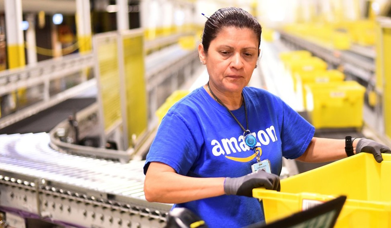 The median worker at Amazon has to work 59 hours to equal what CEO Jeff Bezos is paid for one hour of work. Photo: Reuters