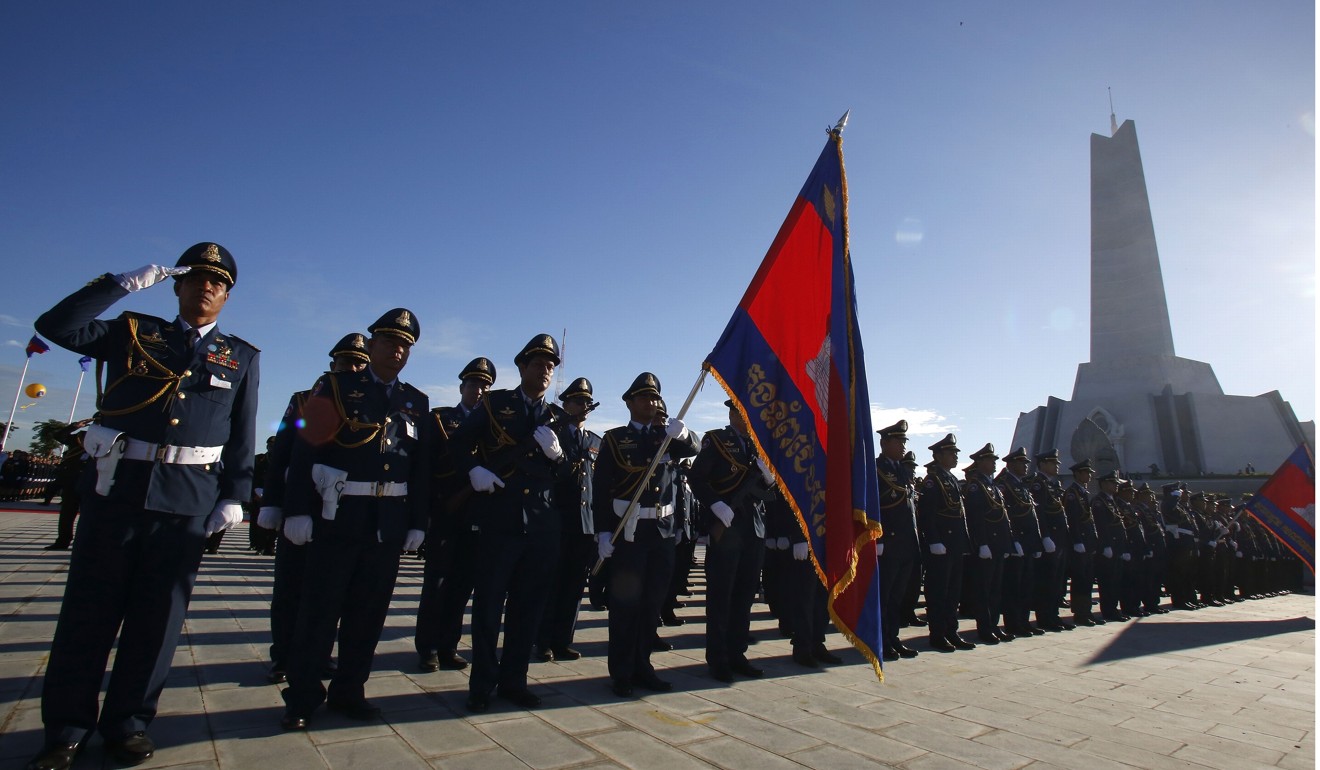 Soldiers stand in formation in front of the monument. Photo: AFP