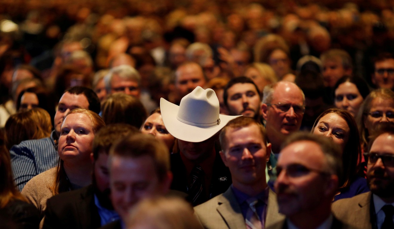 People listen as US President Donald Trump addresses the National Farm Bureau Federation's 100th convention in New Orleans, Louisiana. Photo: Reuters