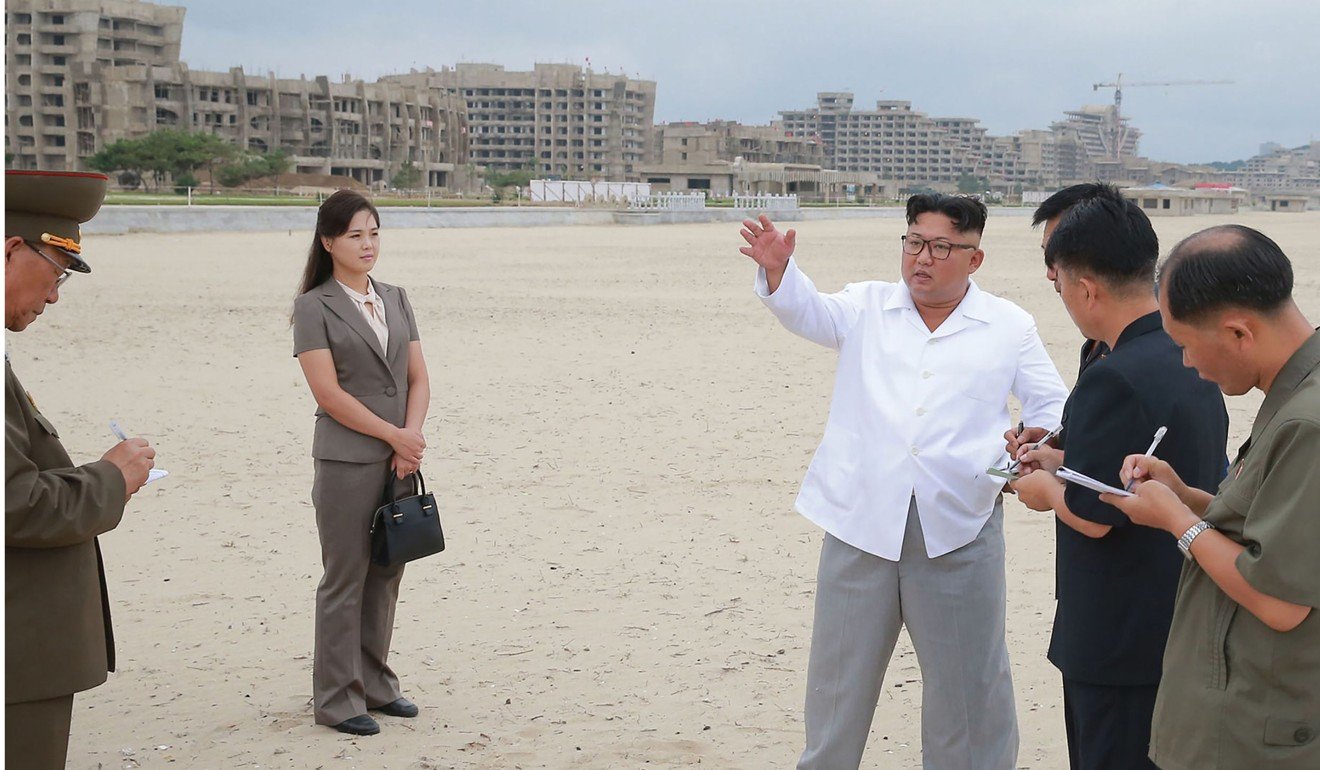 North Korean leader Kim Jong-un and his wife Ri Sol Ju (left) inspecting the construction site of the Wonsan-Kalma coastal tourist area in Kangwon Province. Photo: KCNA