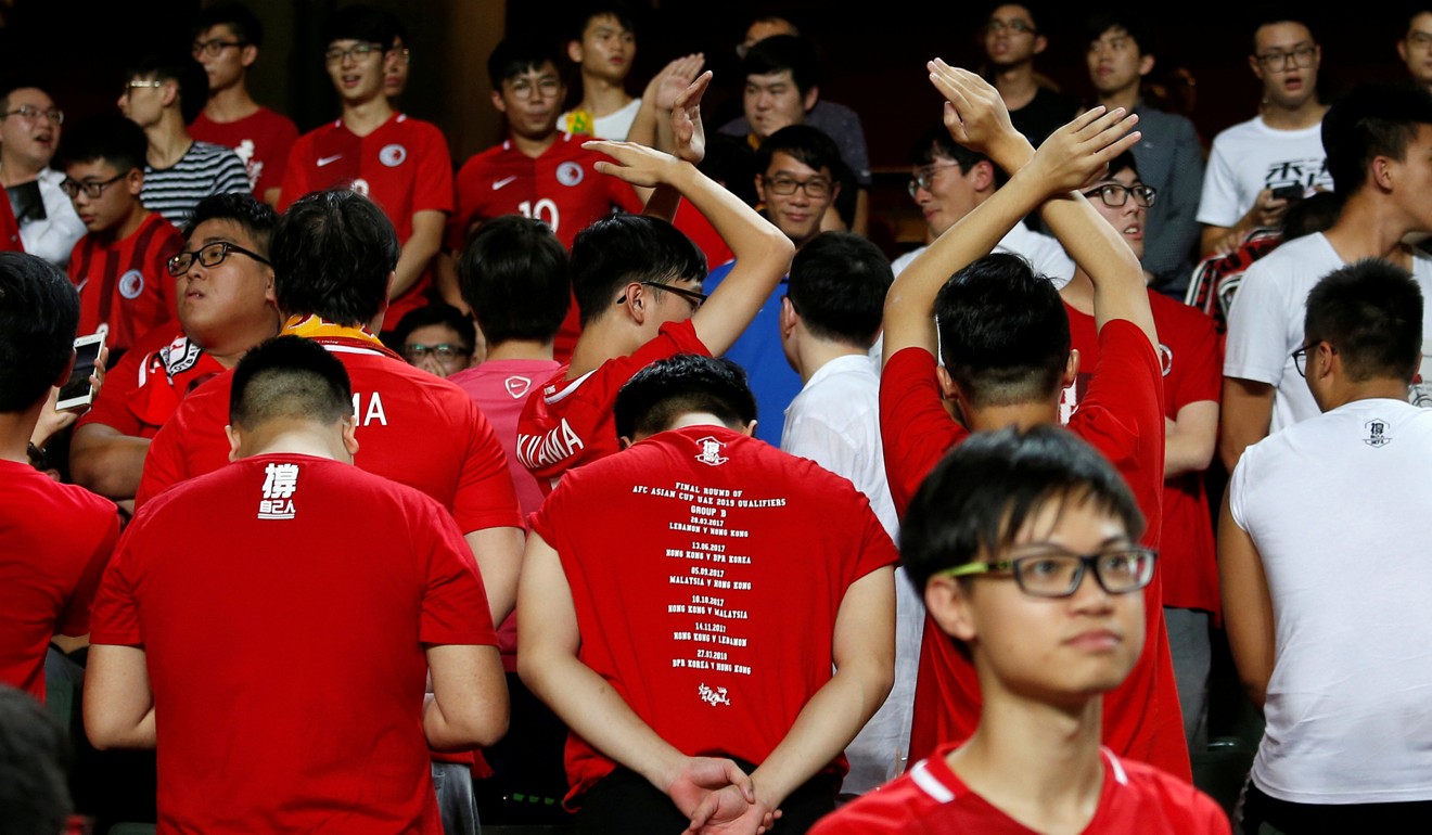 Hong Kong fans turn their backs during the Chinese national anthem before the Asian Cup preliminary match between Hong Kong and Malaysia in October 2017. Photo: Reuters