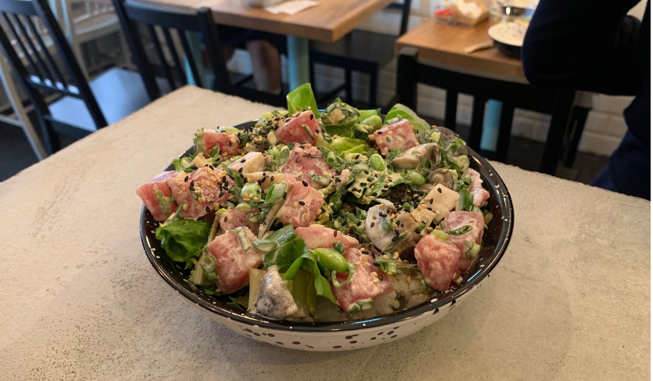 The Ahi-san poke bowl: tuna poke over salad greens and sushi rice, with edamame beans, scallion, mushroom and wasabi yogurt dressing. Photo: Simone McCarthy